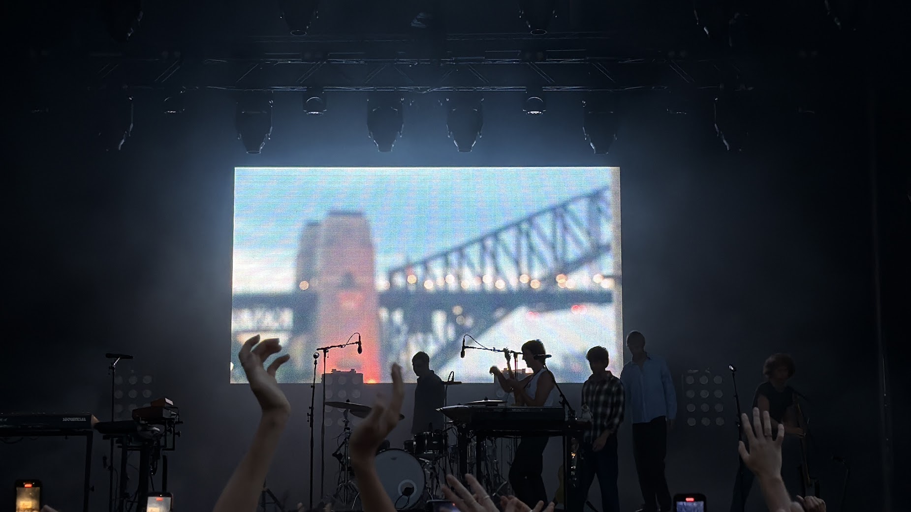 View of a concert stage with the Sydney Harbour Bridge in the background